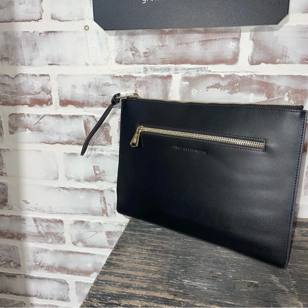 Elegant Black  Clutch with gold tone hardware